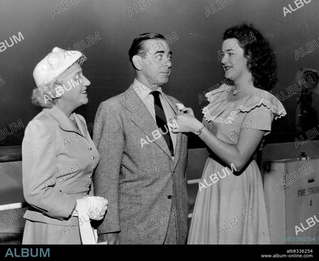 All publicity agencies covered the recent arrival in New York of Judy Gainford, of Cremorne  1947 Miss Australia. Here is Judy with film star Eddie Cantor, and his wife. RKO pictures overcame the dollar shortage by sponsoring Judy's American visit. August 30, 1948. (Photo by Red Heppner, Metropolitan Photo Service).