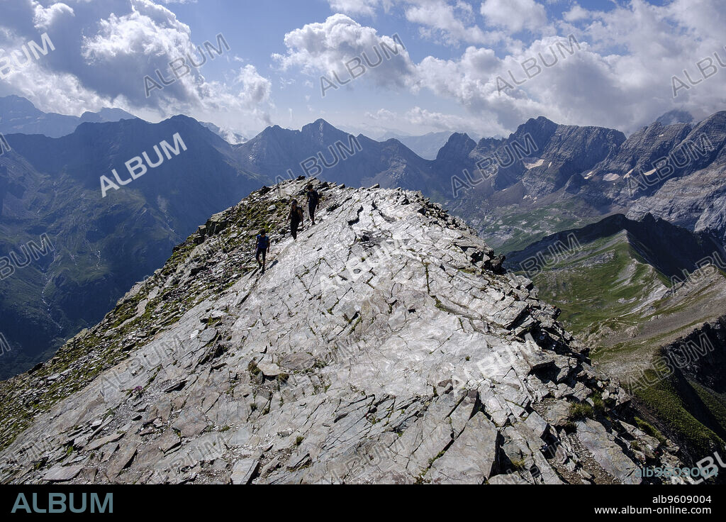 ascending to Pimene peak, Pyrenees National Park, Hautes-Pyrenees, France.