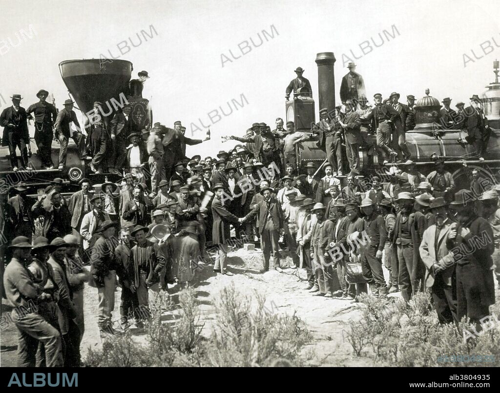 On May 10, in anticipation of the ceremony, Union Pacific No. 119 and Central Pacific No. 60 locomotives were drawn up face-to-face on Promontory Summit in the Utah Territory. It is unknown how many people attended the event; estimates run from as low as 500 to as many as 3,000; government and railroad officials and track workers were present to witness the event. Completing the last link in the Transcontinental Railroad with a spike of gold was the brainchild of David Hewes, a San Francisco financier and contractor. Two of the sides were engraved with the names of the railroad officers and directors. A special tie of polished California laurel was chosen to complete the line where the spike would be driven. The the ceremonial final spike driven by Leland Stanford to join the rails of the First Transcontinental Railroad across the United States connecting the Central Pacific and Union Pacific railroads.
