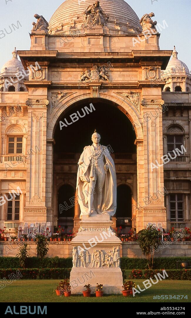 George Nathaniel Curzon, 1st Marquess Curzon of Kedleston (11 January 1859 – 20 March 1925), was a British Conservative statesman who was the Viceroy of India and the Secretary of State for Foreign Affairs, but who was passed over as Prime Minister in 1923 in favour of Stanley Baldwin. He was a key figure in instituting the 1905 Partition of Bengal, which led to a major political crisis for the British Empire. The tax records of Mughal Emperor Akbar (1584–1598) as well as the work of a 15th century Bengali poet, Bipradaas, both mention a settlement named Kalikata (thought to mean ‘Steps of Kali’ for the Hindu goddess Kali) from which the name Calcutta is believed to derive. In 1690 Job Charnock, an agent of the East India Company, founded the first modern settlement in this location. In 1698 the company purchased the three villages of Sutanuti, Kolikata and Gobindapur. In 1727 the Calcutta Municipal Corporation was formed and the city’s first mayor was appointed. In 1756 the Nawab of Bengal, Siraj ud-Daulah, seized Calcutta and renamed the city Alinagar. He lost control of the city within a year and Calcutta was transferred back to British control. In 1772 Calcutta became the capital of British India on the orders of Governor Warren Hastings. In 1912 the capital was transferred to New Delhi while Calcutta remained the capital of Bengal. Since independence and partition it has remained the capital and chief city of Indian West Bengal.