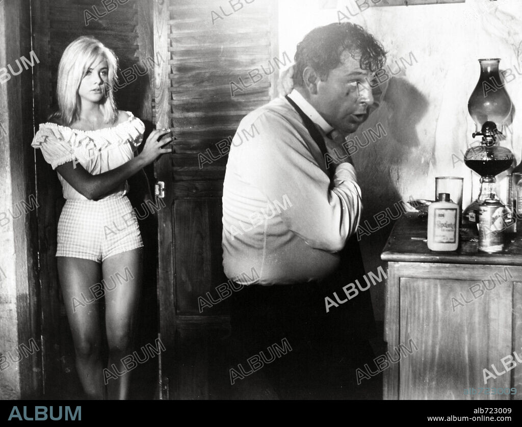 RICHARD BURTON and SUE LYON in THE NIGHT OF THE IGUANA, 1964, directed by JOHN HUSTON. Copyright M.G.M.