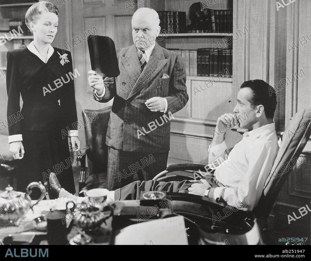 HUMPHREY BOGART y ROSE HOBART en RETORNO AL ABISMO, 1945 (CONFLICT), dirigida por CURTIS BERNHARDT. Copyright WARNER BROTHERS.