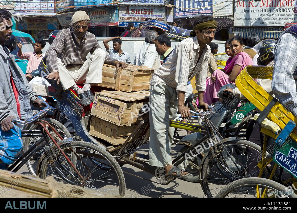 Crowded street scene at Chawri Bazar in Old Delhi, India.