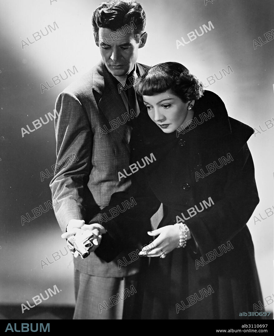 CLAUDETTE COLBERT and ROBERT RYAN in THE SECRET FURY, 1950, directed by MEL FERRER. Copyright RKO.