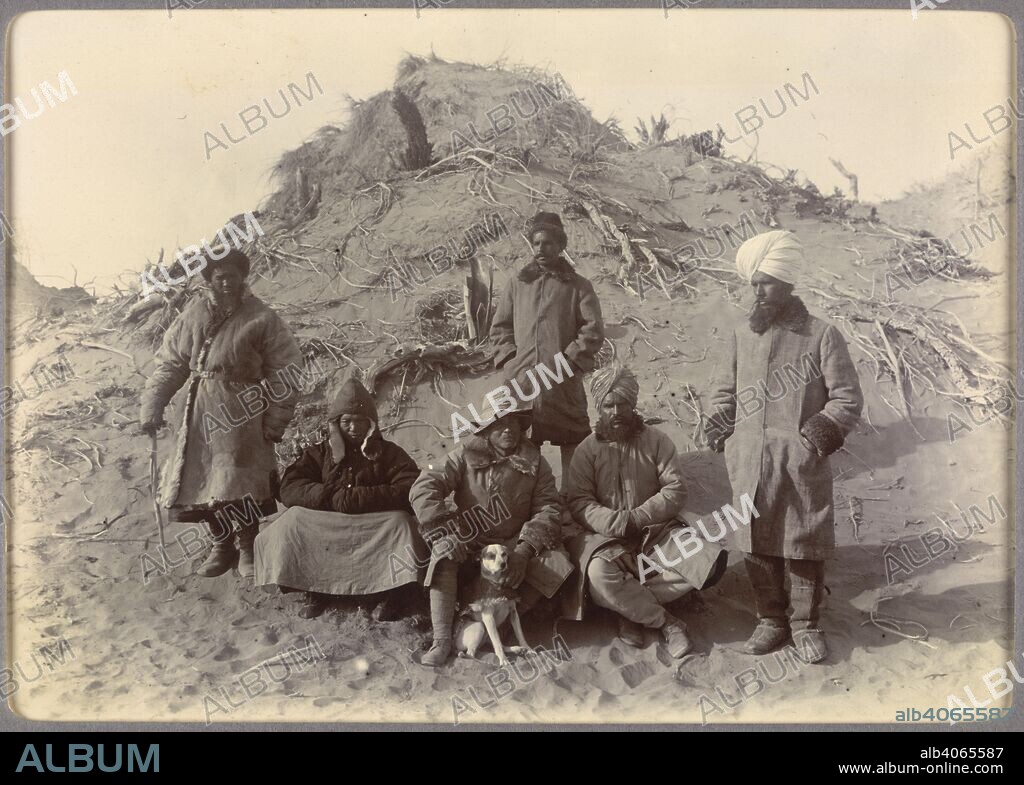 Group at Ulugh-mazar. 1906-08. Ibrahim Beg, Chiang, Sir Marc Aurel Stein, Jasvant Singh, Lal Singh, Ram Singh.  Originally published/produced in 1906-08. . Source: OIOC Photo 392/27(376),.