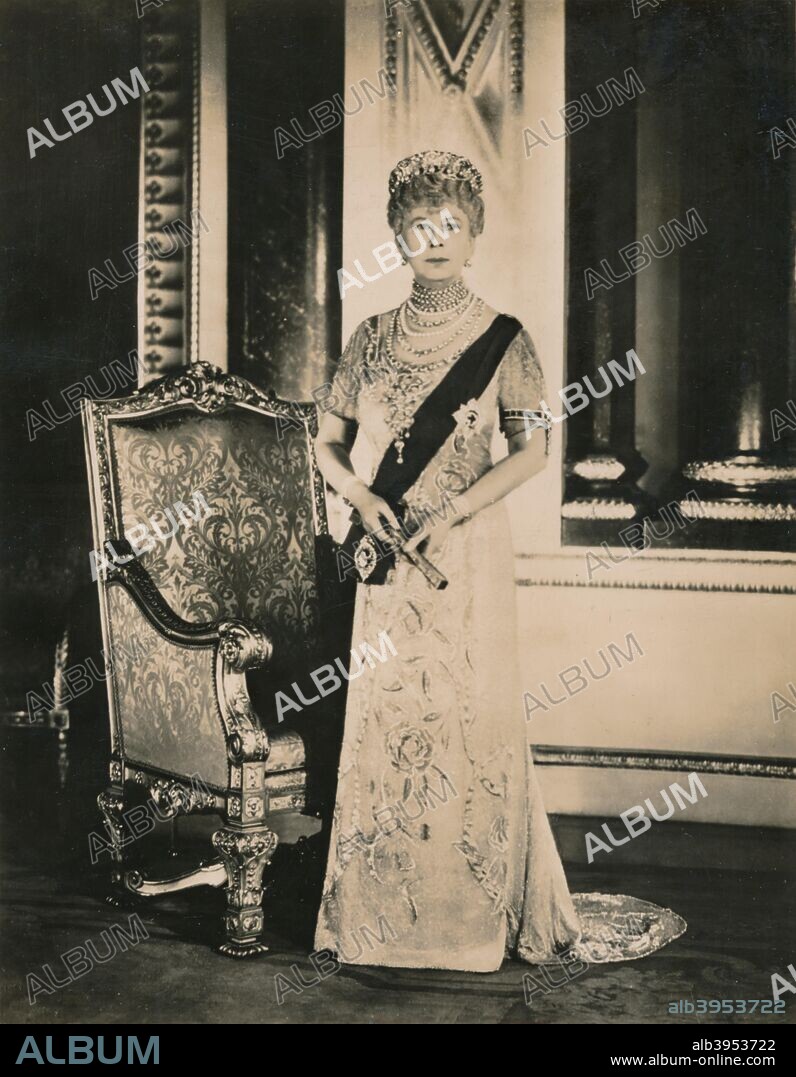 The official Silver Jubilee portrait of Queen Mary (1867-1953), consort of King George V of the United Kingdom. Taken in the Music Room of Buckingham Palace. Photo by Royal Command by Raphael Tuck & Sons, Ltd. 1935.