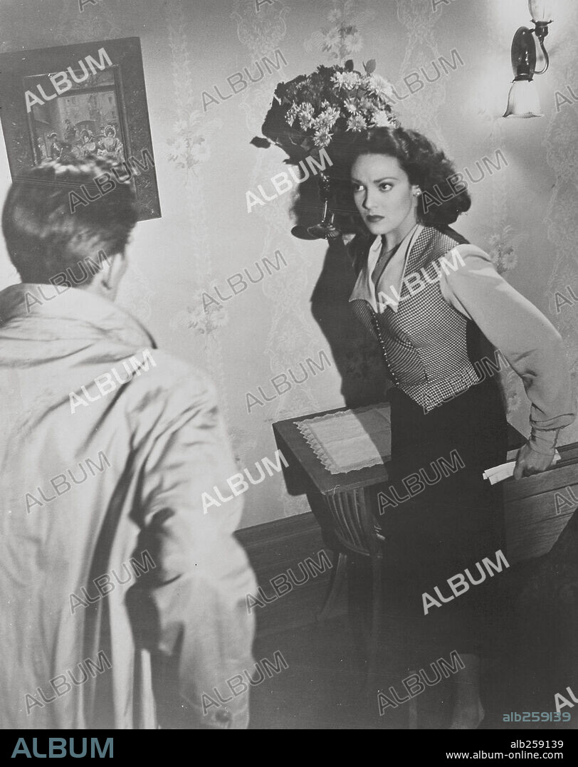 LINDA DARNELL and MICHAEL RENNIE in THE 13TH LETTER, 1951, directed by OTTO PREMINGER. Copyright 20TH CENTURY FOX.