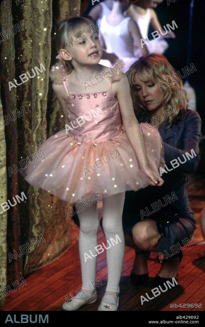 DAKOTA FANNING and HEATHER LOCKLEAR in UPTOWN GIRLS, 2003, directed by BOAZ YAKIN. Copyright METRO GOLDWYN MAYER.