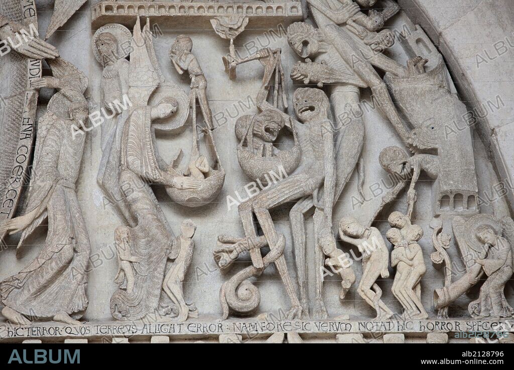 Tympanum. Last Judgment by Gislebertus on the West Portal of Saint-Lazare Cathedral. Saint Michael weighing souls.