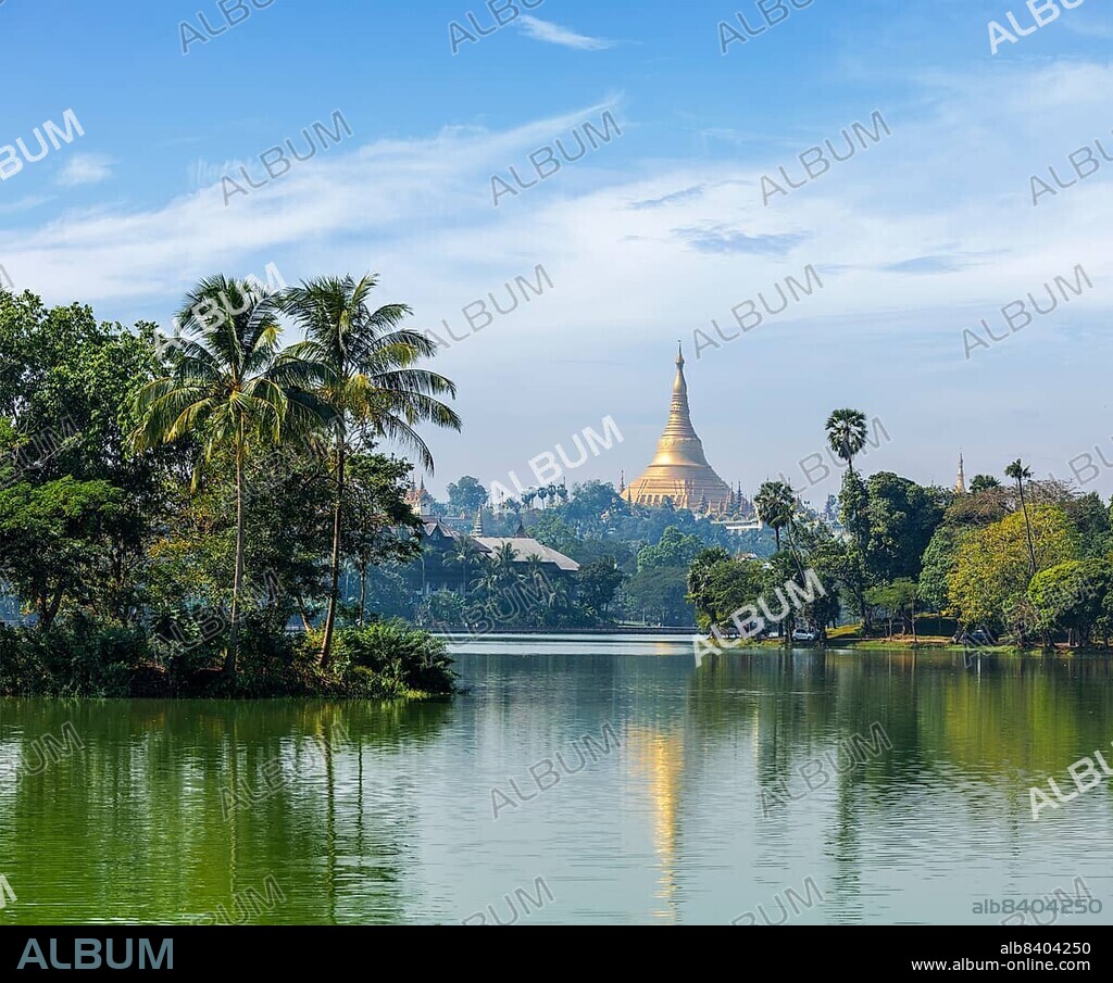 Travel Myanmar tourism background, view of Shwedagon Pagoda over Kandawgyi Lake in Yangon, Burma Myanmar.