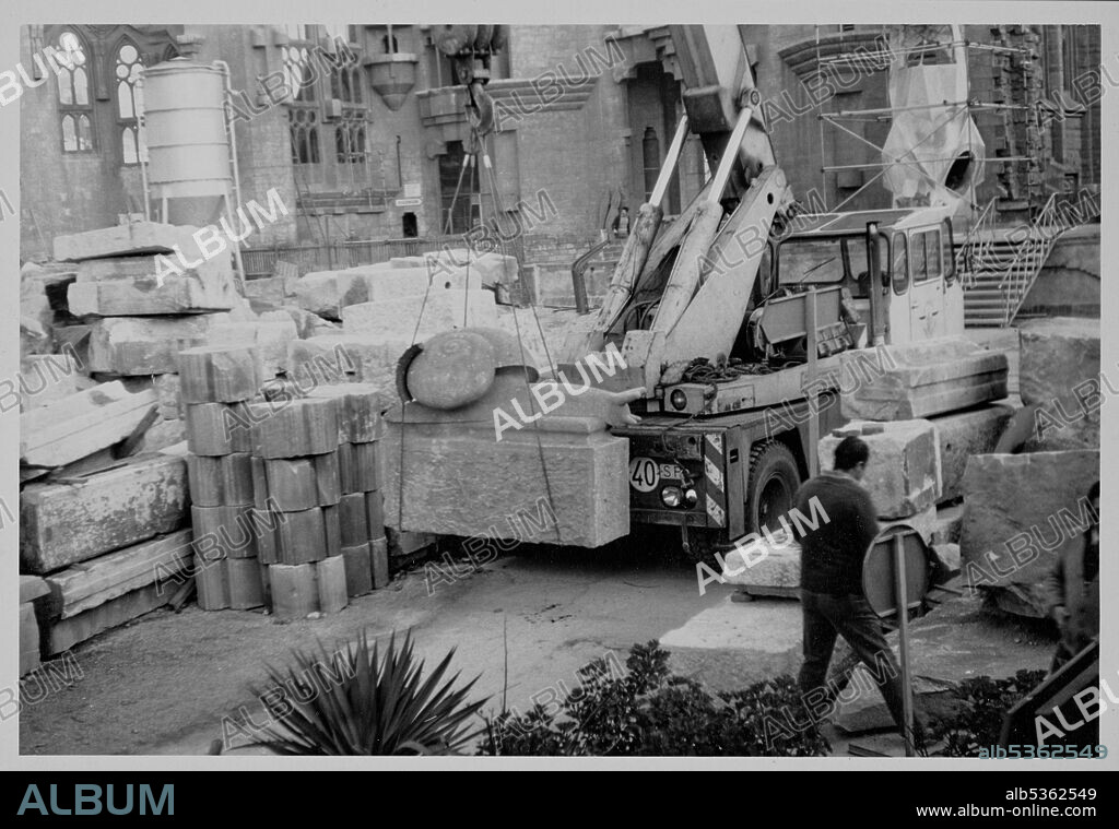 LLORENÇ MATAMALA I PIÑOL. Sagrada Familia (under restauration): installation of gargoyles in the form of land and sea snails on the side stairs at both ends of the apse, c. 1977.