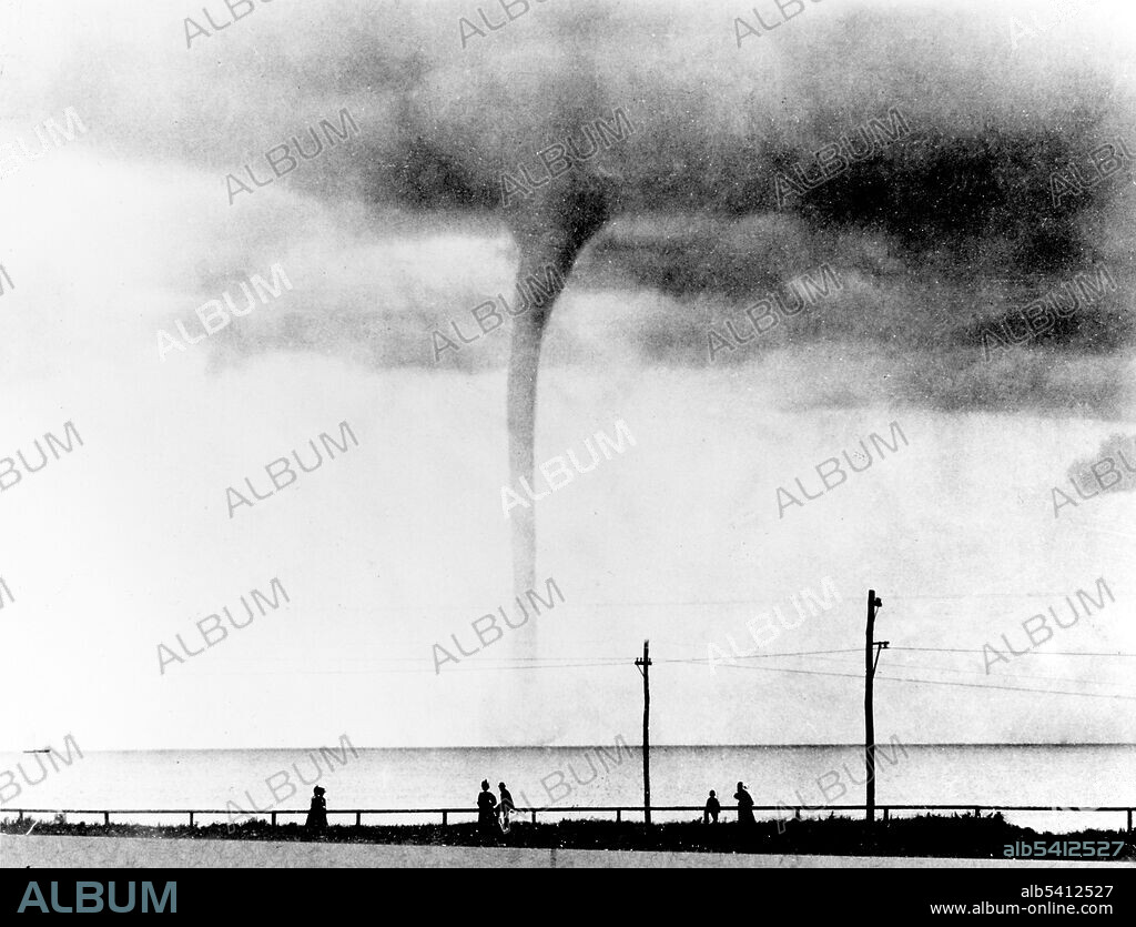 Waterspout on Vineyard Sound, Cottage City, Massachusetts, August 19, 1896. A waterspout is an intense columnar vortex (usually appearing as a funnel-shaped cloud) that occurs over a body of water. Some are connected to a cumulus congestus cloud, some to a cumuliform cloud and some to a cumulonimbus cloud. In the common form, it is a non-supercell tornado over water. Most waterspouts do not suck up water; they are small and weak rotating columns of air over water.  U.S. Naval Institute (cropped and cleaned).