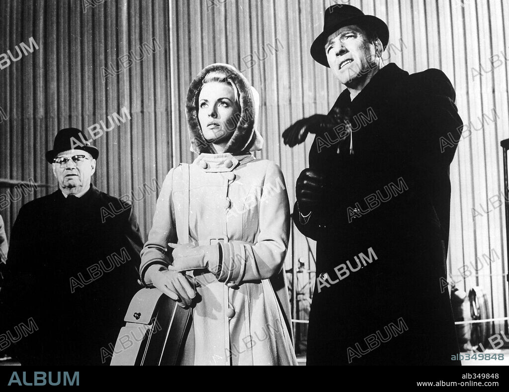 BURT LANCASTER and JEAN SEBERG in AIRPORT, 1970, directed by GEORGE SEATON. Copyright UNIVERSAL PICTURES.