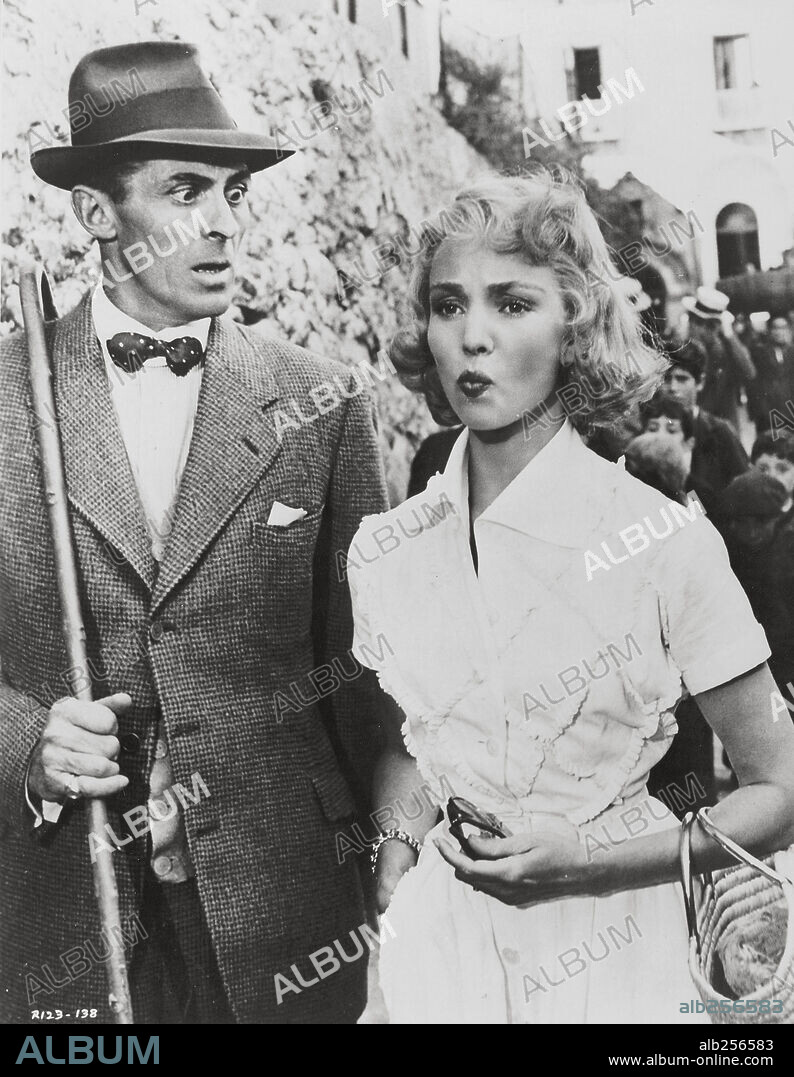 EDWARD UNDERDOWN and JENNIFER JONES in BEAT THE DEVIL, 1953, directed by JOHN HUSTON. Copyright UNITED ARTISTS.