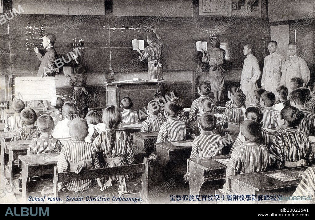 [ 1900s Japan - Classroom at a Christian Orphanage ] Japanese elementary school students studying arithmetics in a classroom at Sendai Christian Orphanage () in Sendai, Miyagi Prefecture. The orphanage was set up in response to the famine of 1905 (Meiji 38). 20th century vintage postcard.