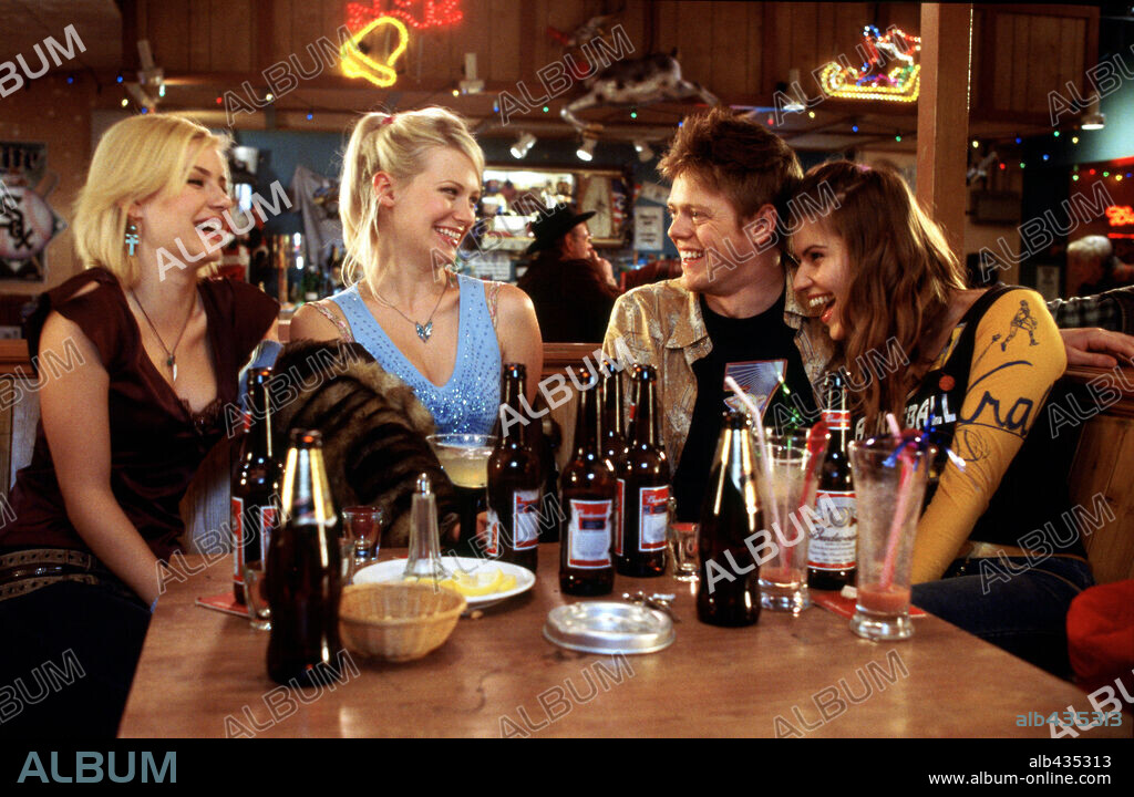 ELISHA CUTHBERT, IVANA MILICEVIC, JANUARY JONES and KRIS MARSHALL in LOVE ACTUALLY, 2003, directed by RICHARD CURTIS. Copyright UNIVERSAL STUDIOS / MOUNTAIN, PETER.