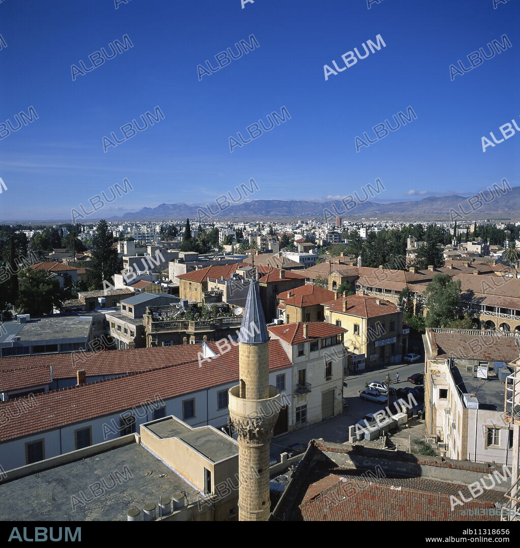 Minaret and skyline of Turkish Cypriot North Nicosia with Kyrenia mountains in distance, taken from Saray Hotel, Nicosia, North Cyprus, Europe.