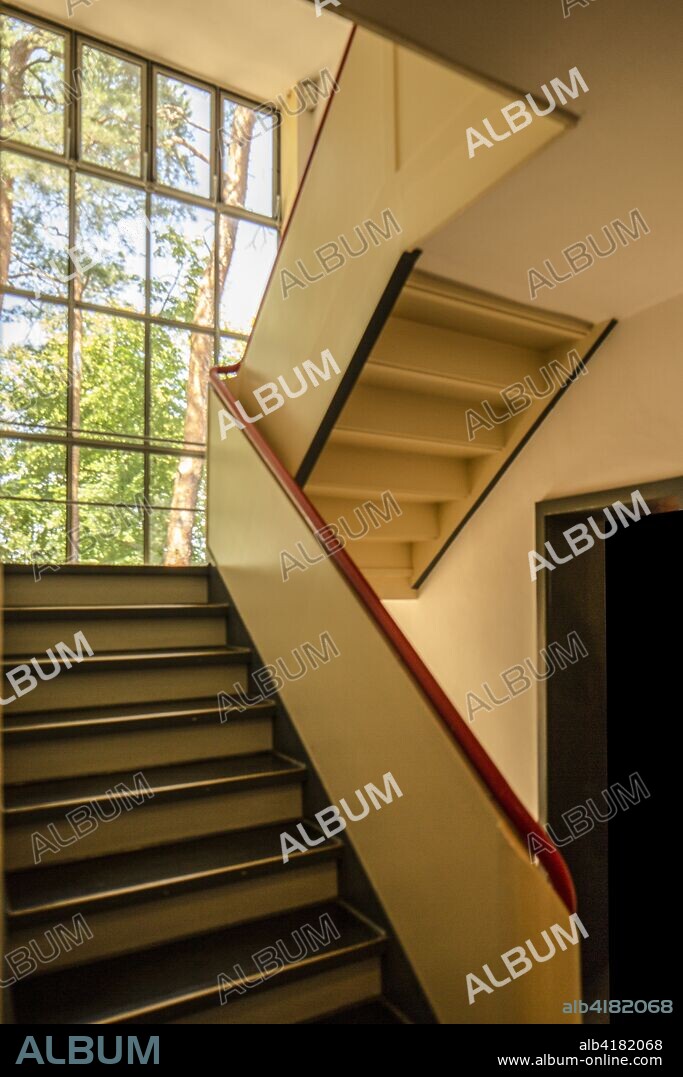 Staircase, Masters' House. Restored paintwork. The Bauhaus building, Dessau, Germany, 2018. Designed by Walter Gropius, 1925-26.