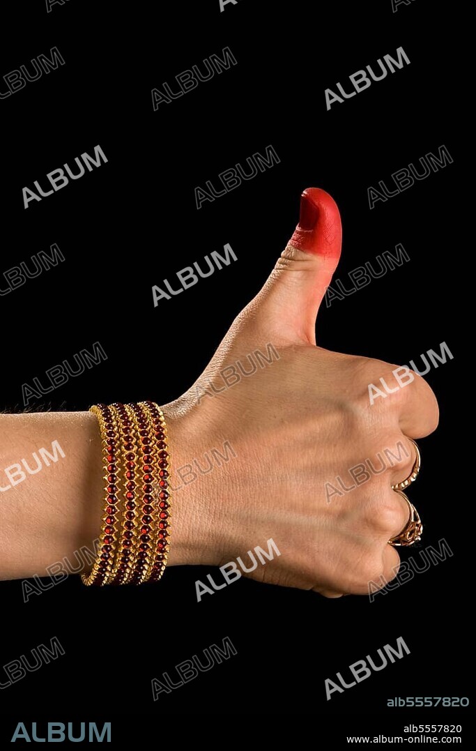 Woman hand showing Shikhara hasta (hand gesture) (also called mudra) (meaning fist) of indian classic dance Bharata Natyam. Also used in Indian dances Odissi and Kuchipudi.