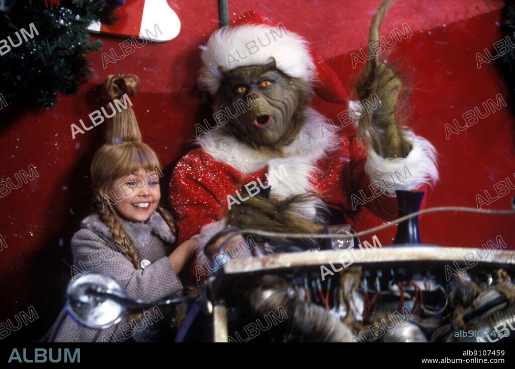 JIM CARREY und TAYLOR MOMSEN in HOW THE GRINCH STOLE CHRISTMAS, 2000, unter der Regie von RON HOWARD. Copyright UNIVERSAL.