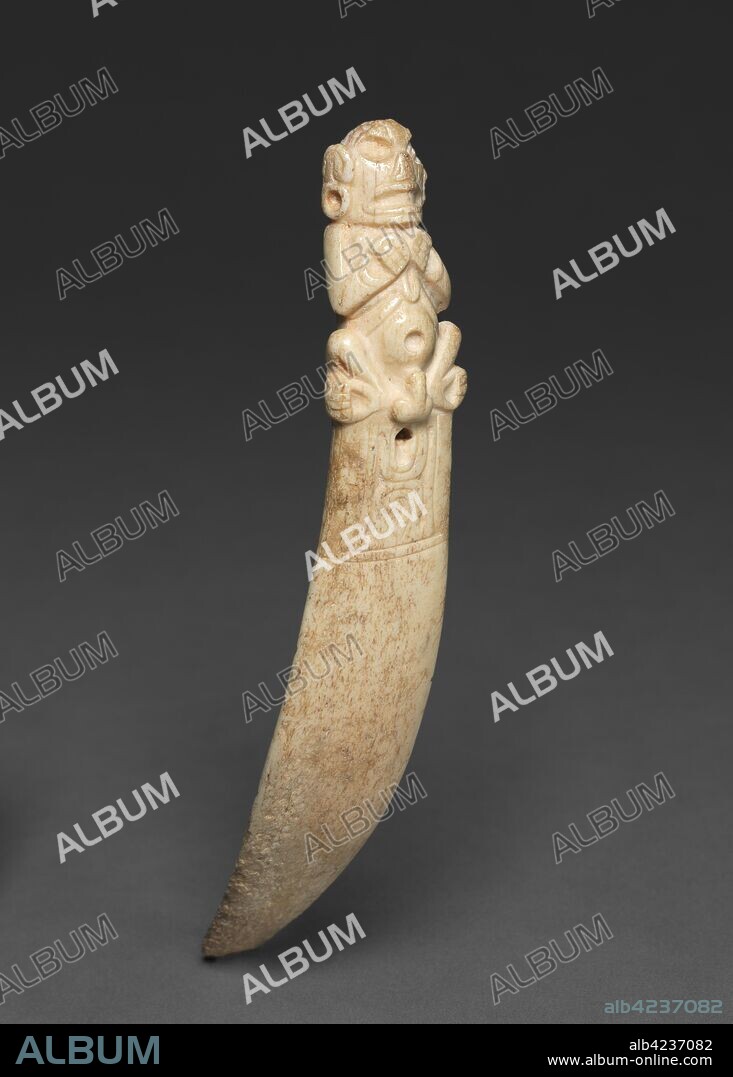 Spatula, 900-1492. Caribbean, Greater Antilles, Taino, 10th-15th century. Manatee bone; diameter: 1.7 cm (11/16 in.); overall: 19.1 x 3.2 x 11 cm (7 1/2 x 1 1/4 x 4 5/16 in.).