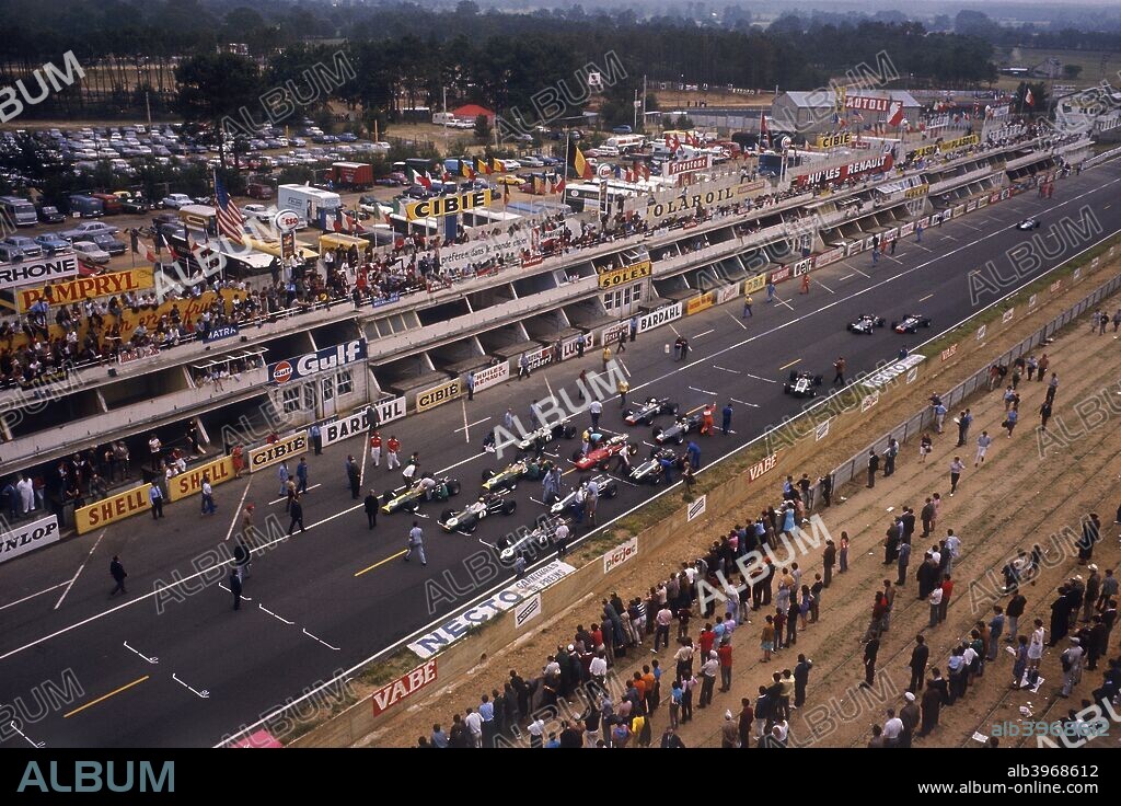 Starting grid of the French Grand Prix, Le Mans, 1967. The race was held for the first time at the new Bugatti au Mans circuit, which used the famous start/finish line of the classic 24 Hour Race circuit, but included a new section which was regarded by drivers and spectators alike as too twisty for exciting racing, leading many of the public to stay away. The race featured a one-two for the Brabham-Repco team, with Jack Brabham the winner ahead of his team-mate Denny Hulme, who went on to win the World Drivers' Championship.