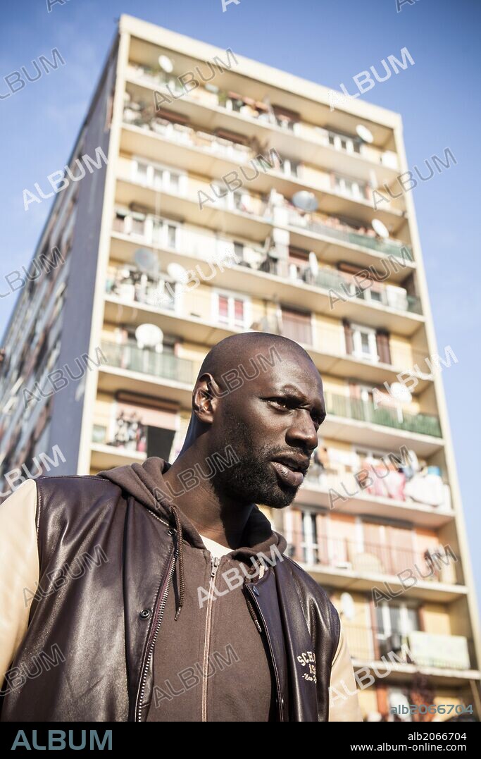 OMAR SY in ON THE OTHER SIDE OF THE TRACKS, 2012 (DE L'AUTRE COTE DU PERIPH), directed by DAVID CHARHON. Copyright MANDARIN FILMS.