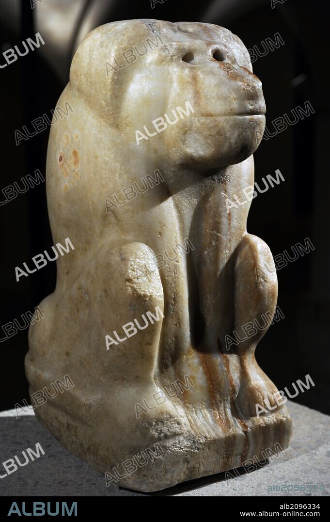 ARTE EGIPCIO. EGIPTO. Figura sentada de un babuino con cartucho del rey Narmer o Menes, considerado el primer faraón. I Dinastía. Período Arcaico. Hacia el 3000 a. C. Calcita-alabastro. Neues Museum (Nuevo Museo). Berlín. Alemania. Europa.