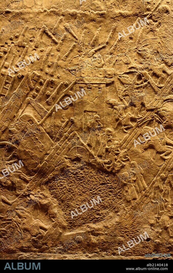 Wall panel depicting the assault on Lachish. Assyrian, approximately 700-692 BC. From the South-West Palace in Nineveh. Shows men and women streaming out of the town into exile. (Photo by: Universal History Archive/UIG via Getty Images).