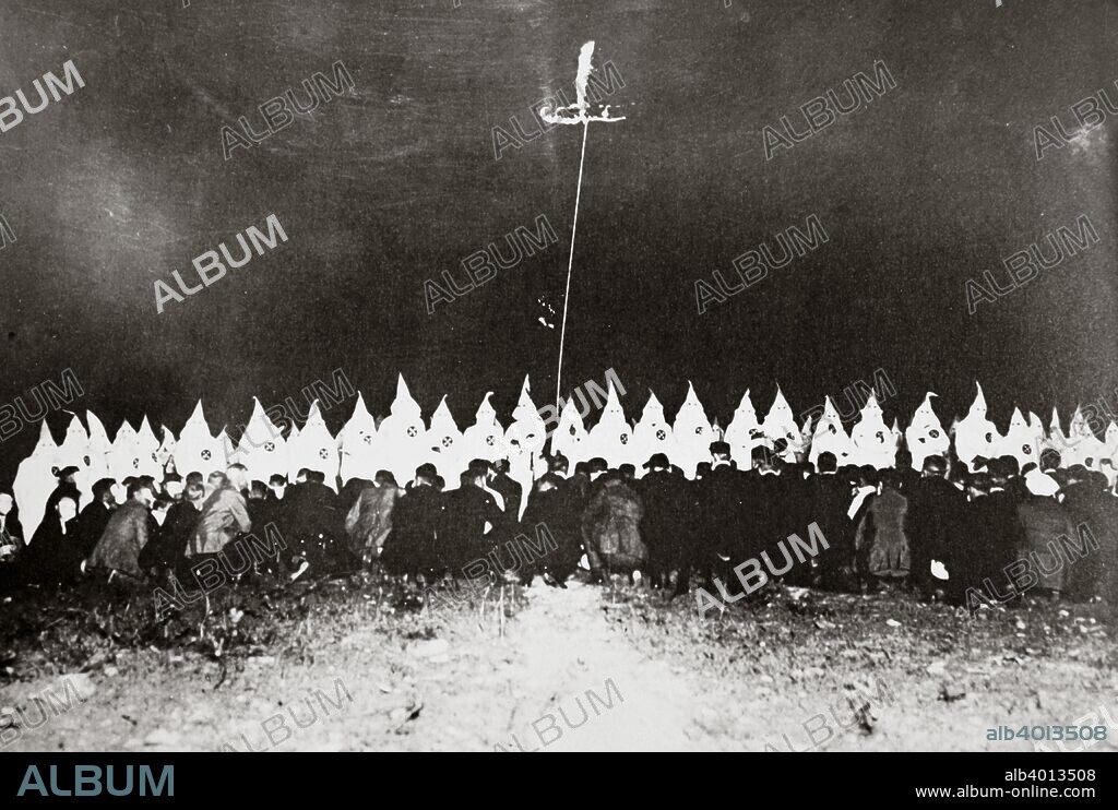 Ku Klux Klan initiation ceremony near Brunswick, Maryland, USA, c1920s(?). The second incarnation of the Ku Klux Klan was founded in 1915. In the years immediately following the First World War its membership grew rapidly as racial tension escalated following large-scale migration of African Americans and Southern and East European immigrants to the cities of the North and the Midwest.