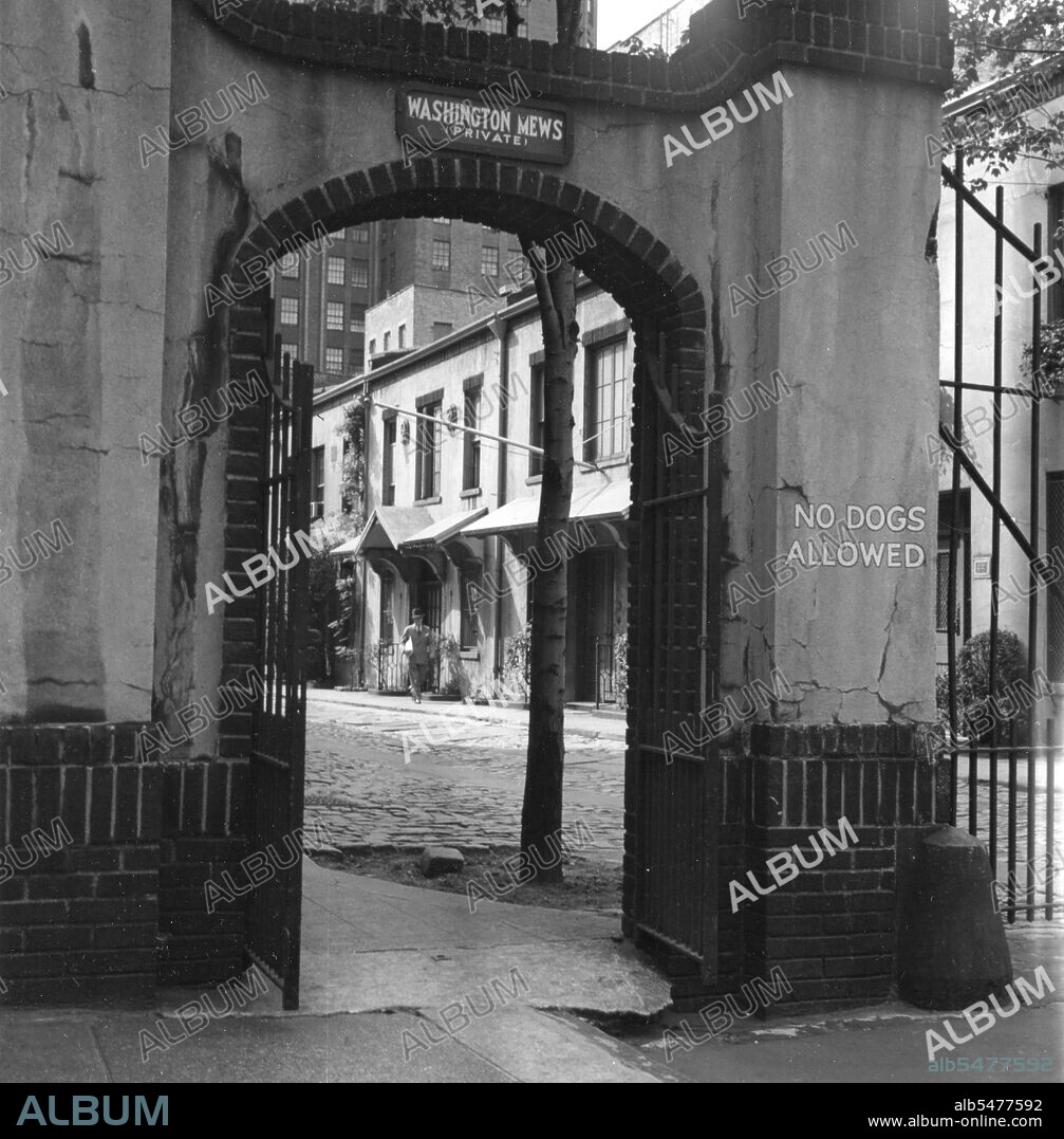 Street scene. Entrance to Washington Mews. New York, NY, 1954.