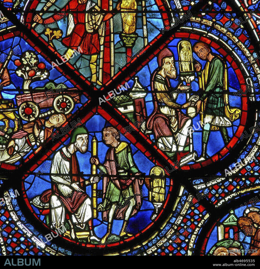 Un juif prete de l'argent a un homme devant la statue de St Nicolas. Vitrail de la cathedrale de Chartres datant du 13e, XIIIe s. Photographie par Painton Cowen. Credit : Collection COWEN/KHARBINE-TAPABOR.