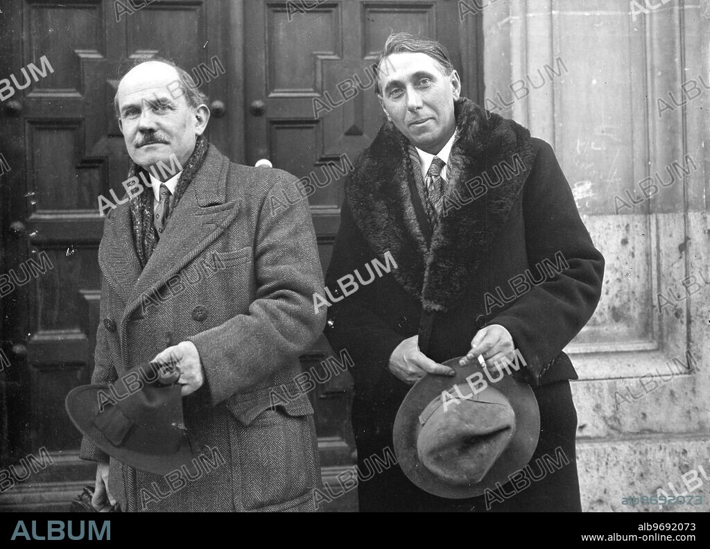 Grandson of great painter charged with faking masterpieces . Hundreds of faked masterpieces are concerned in the trial at Fontainebleau , France of Jean Charles Millet , grandson of the famous painter . With Millet in the dock is Paul Cazot , a retired house painter and his wife Madame Cazot . The charges are of selling pictures bearing the forged signature of Millet ' s grandfather and other famous 19th century masters. Photo shows ; Gabriel Freyssanges , M Georges Terrice . 29 January 1935.