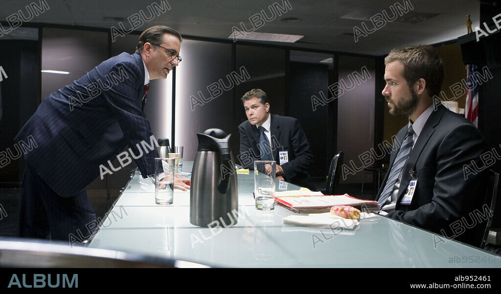 ANDY GARCIA, RAY LIOTTA and RYAN REYNOLDS in SMOKIN' ACES, 2007, directed by JOE CARNAHAN. Copyright WORKING TITLE FILMS/RELATIVITY MEDIA/SCION FILMS LIMITED/ / TRUEBLOOD, JAMIE.