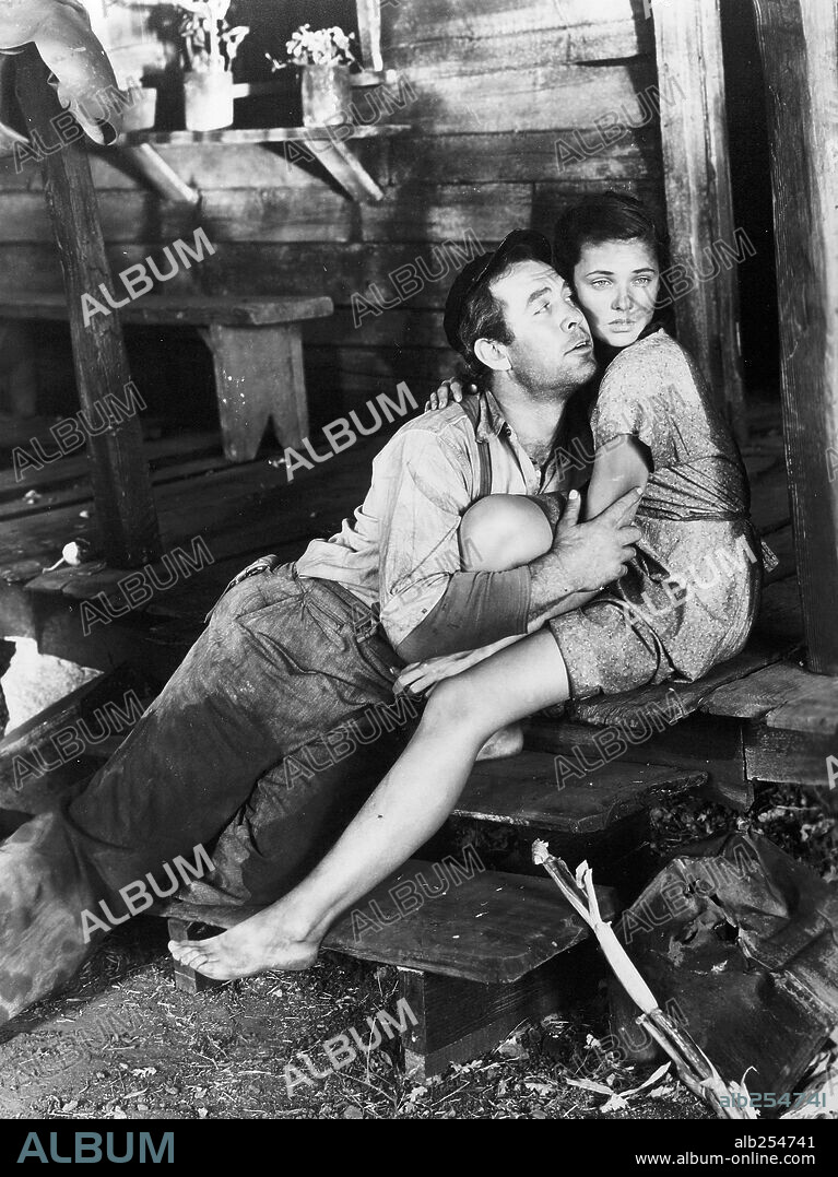 GENE TIERNEY and WARD BOND in TOBACCO ROAD, 1941, directed by JOHN FORD. Copyright 20TH CENTURY FOX.