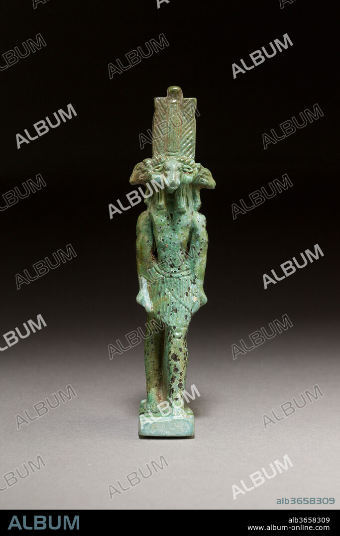 God with four ram heads facing in four directions, probably Khnum. Dimensions: H. 11 × W. 2.5 × D. 1.4 cm (4 5/16 × 1 × 9/16 in.). Date: 664-30 B.C..
The god has four ram heads, each facing in a different direction. Above his heads he wears an atef crown. The figure probably represents the ram-headed god Khnum, who can be shown with four heads facing in different directions. Another ram god, Banebdjed, can also be shown with four ram heads, but then two face forward and two face back (see 26.7.894).