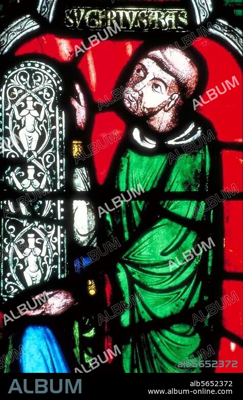 Suger, franz. Staatsmann, Geschichtsschreiber u. Theologe, ab 1122 Abt von Saint-Denis; 1081-1151. "L'abbé Suger présente le plan de l'abbaye de Saint-Denis à Salomon". (Abt Suger zeigt König Salomon den Plan der Abteikirche von Saint-Denis). Glasmalerei, 12. Jh. Saint-Denis, Abteikirche.