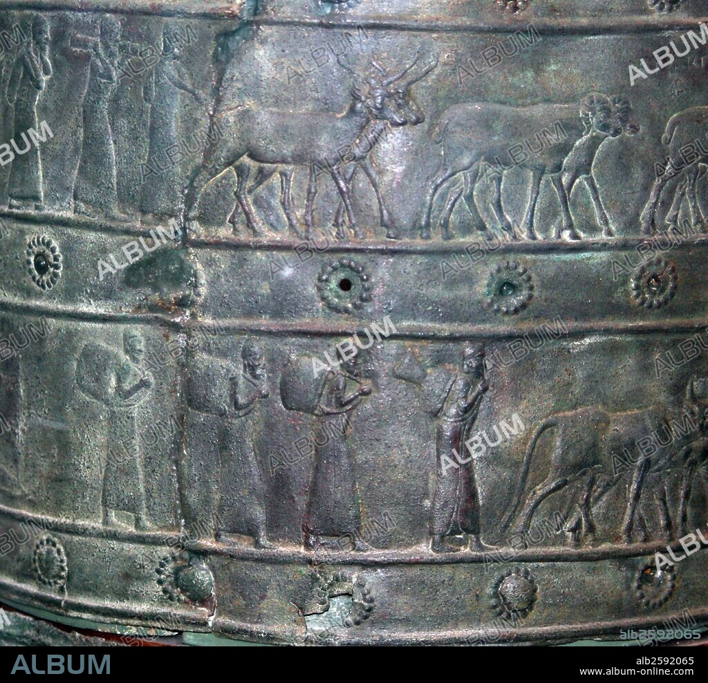 The Balawat Gates were erected by Shalmaneser III (858-824 BC) in his palace at Balawat.  The original gates were wood, partly covered and reinforced with strips of bronze, which were the only parts that survived.