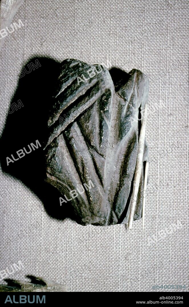 Paleolithic Polishing Stone for Sharpening Bone Harpoons from Dordogne, c50,000-10,000 BC.  Paleolithic age is a prehistoric period of human history distinguished by the development of the most primitive stone tools.