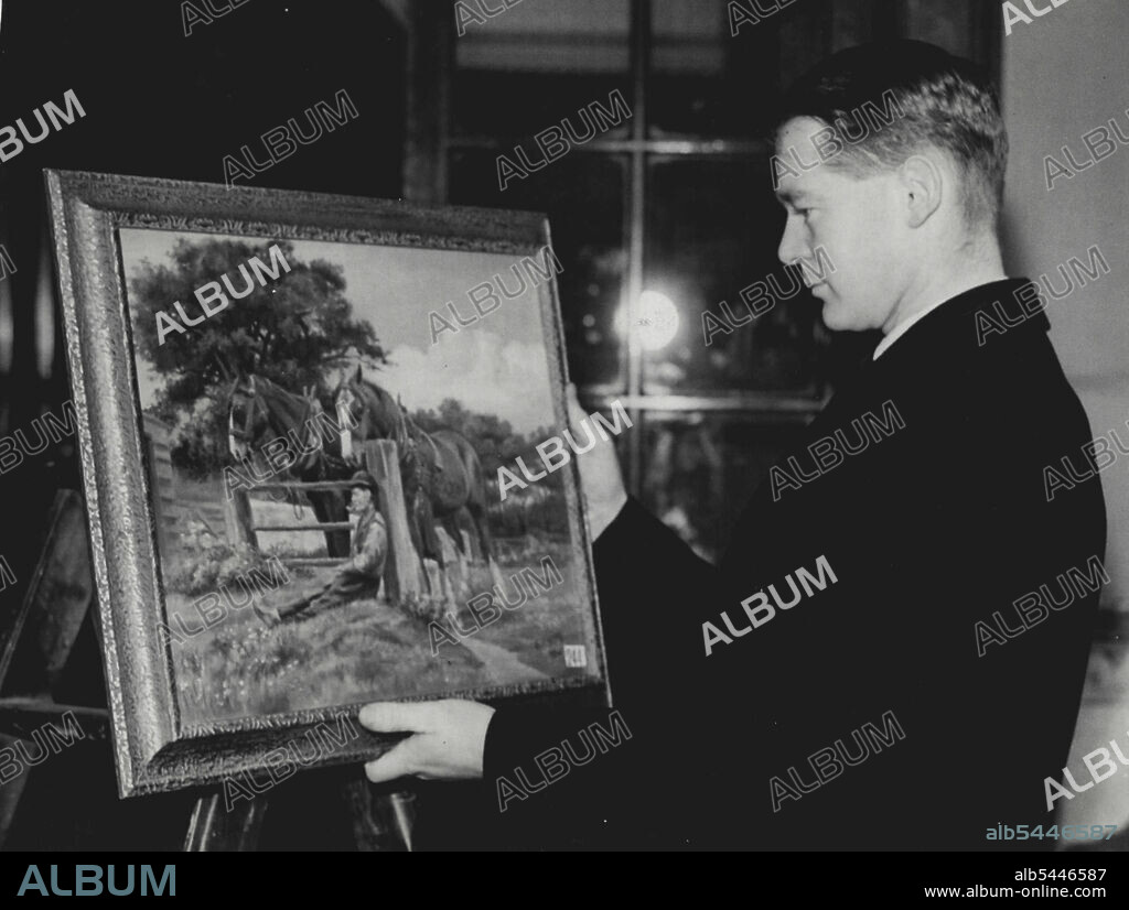 Painting By Armless Artist - Captain J.H. Macnamara M.P., examining a painting by an armless artist, Mr. Edward Josling of Salford-who paints by means of his feet. Submitted for the exhibition of oil paintings to be held at the New Burlington Galleries London. shortly. Fifteen thousand paintings were submitted. March 18, 1936. (Photo by London New Agency Photos Ltd.).