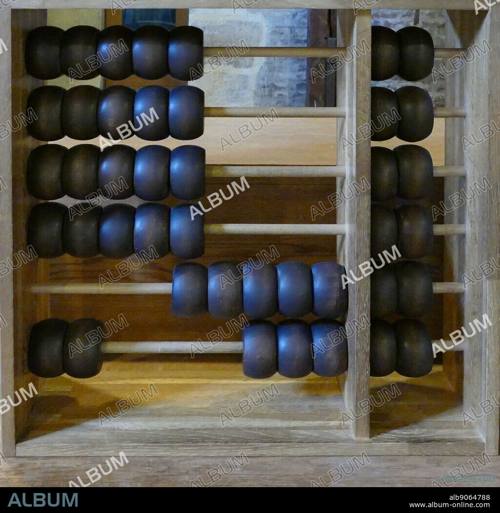 Chinese abacus counting frame, a calculating tool that was in use in Europe, China and Russia, centuries before the adoption of the written Hindu-Arabic numeral system. The exact origin of the abacus is still unknown. Today, abacuses are often constructed as a bamboo frame with beads sliding on wires, but originally they were beans or stones moved in grooves in sand or on tablets of wood, stone, or metal.. Abacuses come in different designs.