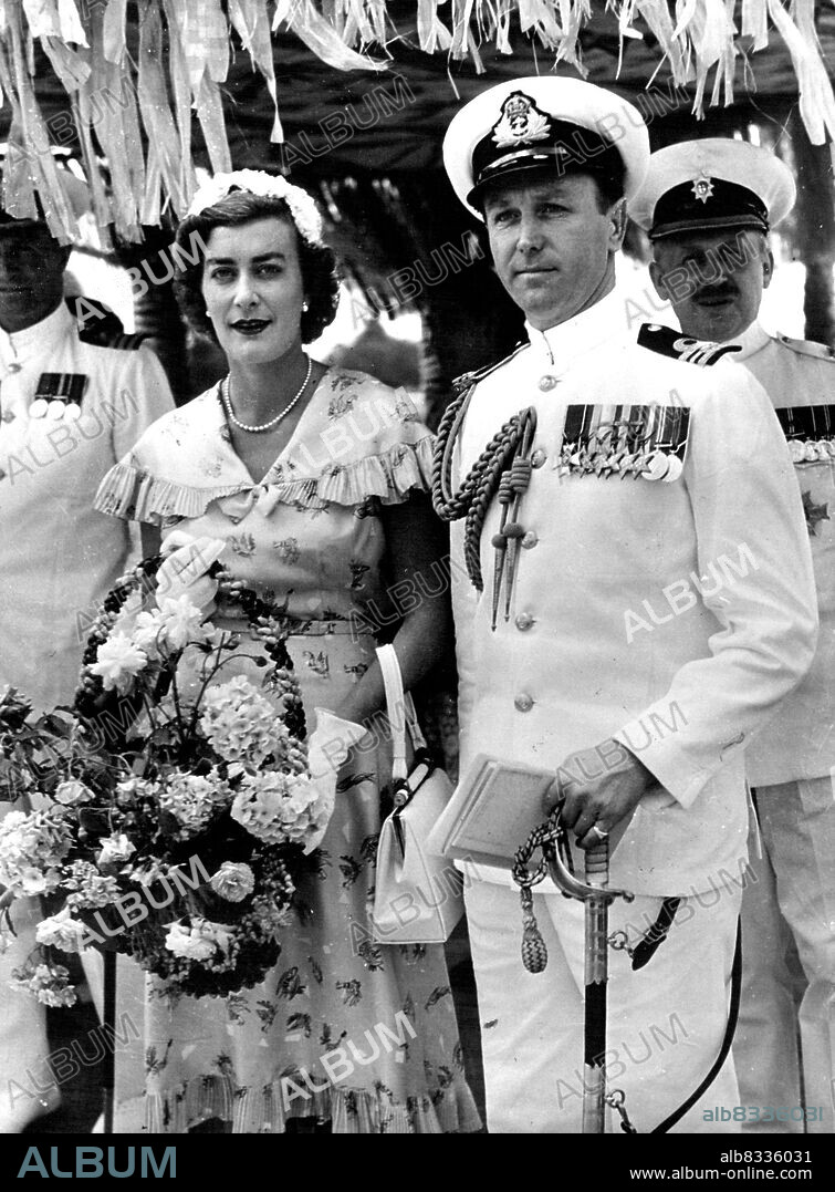 The Royal Tour -- Lady Pamela Mountbatten, Lady-in-waiting to H.M. The Queen, and Commander Michael Parker, Private Secretary to H.R.H. The Duke of Edinburgh, are principal members of the entourage of the Royal tour of New Zealand and Australia. They are here photographed during the visit to Tong. January 20, 1954. (Photo by Camera Press).