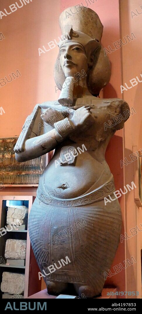 Statue of Pharaoh Akhenaten wearing the double crown of upper and Lower Egypt. Akhenaten introduced monotheism by exclusive worship of the Sun God Aten. 18th dynasty. Egyptian 1334 BC.