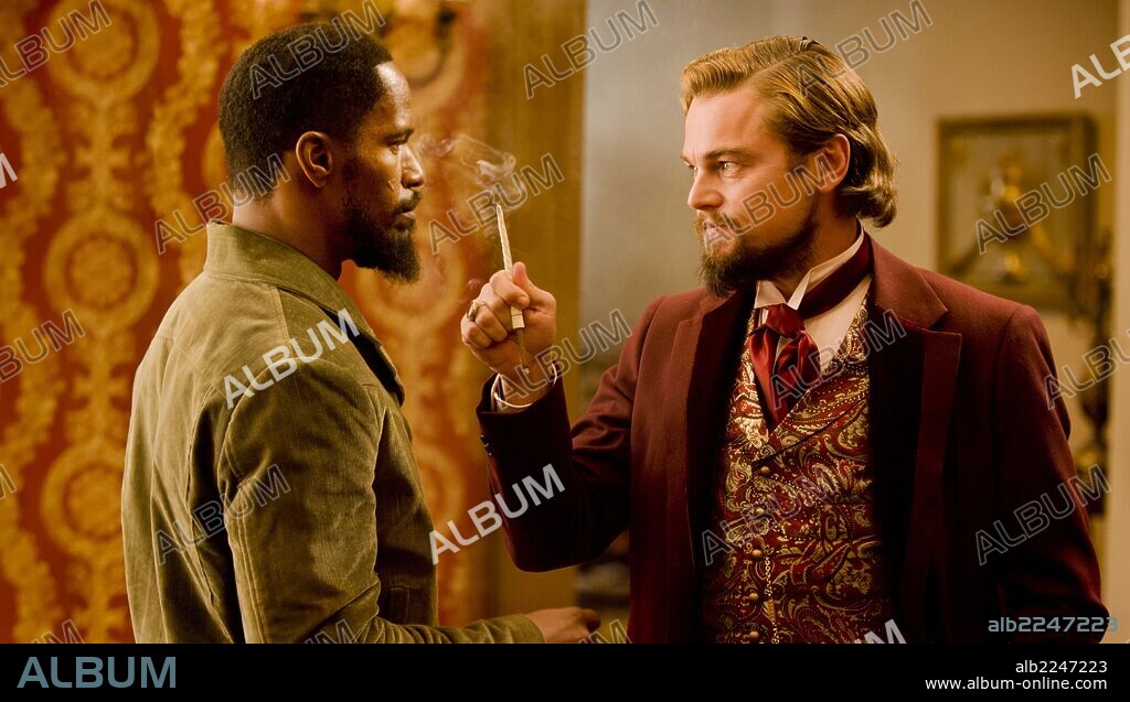 di caprio and JAMIE FOXX. JAMIE FOXX and Leonardo DiCaprio in DJANGO UNCHAINED, 2012, directed by QUENTIN TARANTINO. Copyright COLUMBIA PICTURES.
