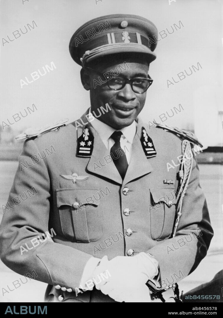 Orig. Bildtext... CONGO COUP MOBUTU OUSTS KASAVUBU. GENERAL JOSEPH MOBUTU; The former sergeant who rose to power in the turmoil of Congolese independence to-day deposed PRESIDENT KASAVUBU fot the second time. A dawn proclamation over Leopoldville Radio announced the blodless coup. It said Mobutu ages 35, appointed army chief by mr. Kasavubu in 1961 had nemed COLONEL LEONARD MILAMBA, 34 as prime minister, in place of mr.Evariste Kimba. President Kasavubu accused mr. Kimba only 10 days ago of traying to form a Government after mr. MOISE TSHOMBE was removed from office as prime minister following bitter conflict whit the president. Photo Shows a recent porträtt of general Mobutu. Anm. cd 236 militärkupp persons: JOSEPH MOBUTU sites: KONGO;AFRIKA.