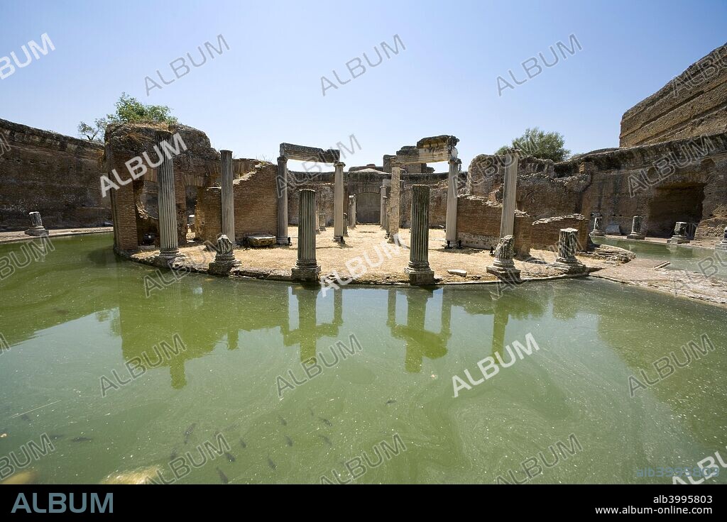 The Maritime Theatre at Hadrian's Villa, Tivoli, Italy. Hadrian's Villa was the luxurious retreat of Emperor Hadrian in Tibur (modern Tivoli) and was one of the most magnificent villas in the ancient world. It was built in the 2nd century AD as a home for the emperor and his court. During the later years of his reign, he actually governed the empire from the villa. The villa shows echoes of many different architectural orders, mostly Greek and Egyptian.