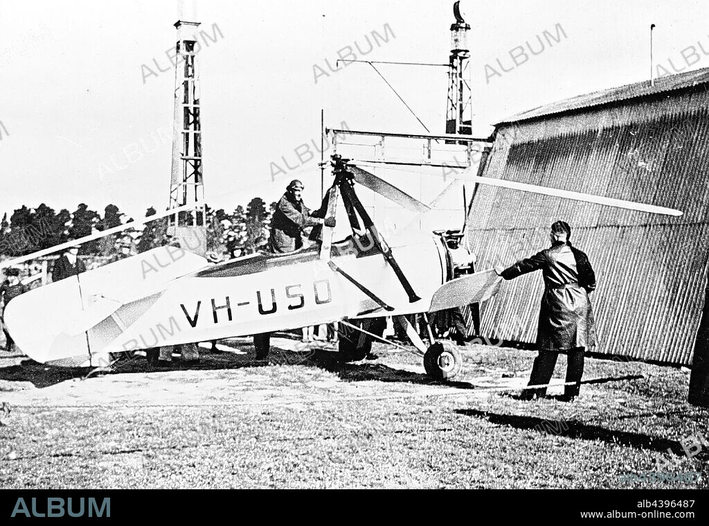 Negative - Cierva Autogiro VH-USO, Ballarat, Victoria, circa 1935, A Cierva C.19 Mk IVP (Avro 620) autogiro with the civil registration VH-USO on a demonstration visit to Ballarat. In the background, hand- operated refuelling pumps. This machine was imported by the Autogyro Corporation of Australia in late 1934 and was the first autogiro to fly in Australia when it was test flown at Essendon on 1 October 1934. It was badly damaged in an accident in June 1935.