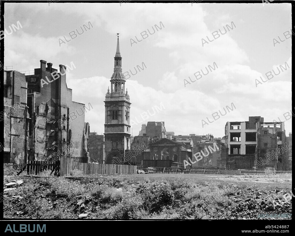 CHARLES WILLIAM PRICKETT. St Mary-le-Bow Church, Cheapside, City and County of the City of London, Greater London Authority, 1941-1945. A view looking east across a bomb damaged landscape towards St Mary-le-Bow Church. St Mary-le-Bow was rebuilt by Christopher Wren after the Great Fire of London in 1666. During the Second World War it was almost destroyed by bombing on 10th May 1941 with incendiary bombs causing a fire which sent the bells in its tower crashing down to the ground. The tower was left standing and restoration of the church began in 1956.