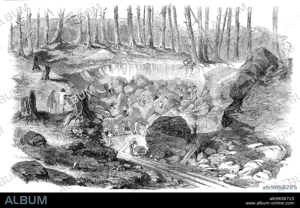 Copper mine or quarry, near Montreal, Canada - from a sketch by our special artist, G. A. Andrews, 1860. Excitement due to the '...discovery of an immense deposit of copper ore in the hillside near the village of Acton, Canada East...Excursion-trains run from Montreal expressly to visit the mines; and, as the proprietor makes a charge for admission...he is likely to make a rich harvest of gold and silver, as well as of copper, by his discovery...The face of a considerable hill has been laid open, and what appears a large stone quarry is being worked by about a hundred men, who are continually blasting with gunpowder, and using all the ordinary means for getting out blocks of dark grey stone, which, on a closer examination, will be found to be good rich copper ore...the whole mass of the hill appears to be of the same valuable material...The overburden is a yellow loamy sand, about eight feet thick, immediately under which is the metal-bearing rock...At the excavation the roots of the trees can be seen penetrating through the loam into the cracks and fissures of the rock which carries the metal. The yield of copper is eleven tons of ore, carrying 20 per cent of copper, for every cubic fathom of rock excavated'. From "Illustrated London News", 1860.