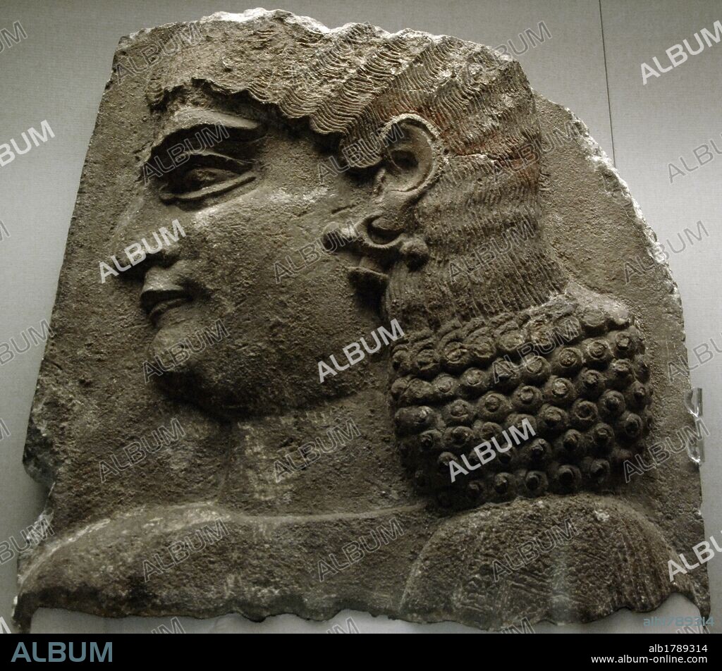 ARTE MESOPOTAMICO. ASIRIO. S. VIII a. C. Relieve que representa la CABEZA DE UN EUNUCO. Fechado hacia el año 710 a. C. Procede del Palacio de Sargon. Korsabad. Museo Británico. Londres. Inglaterra. Reino Unido.